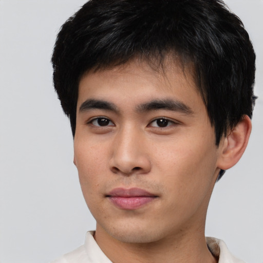 Neutral asian young-adult male with short  black hair and brown eyes