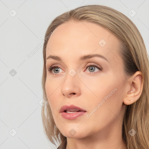 Neutral white young-adult female with long  brown hair and brown eyes