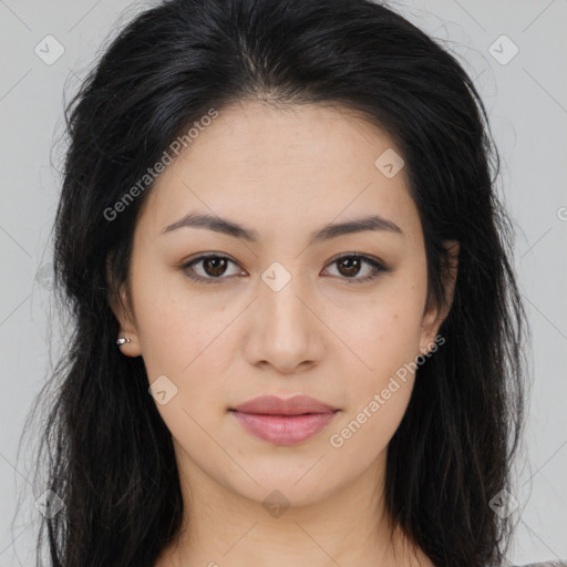 Joyful asian young-adult female with long  brown hair and brown eyes