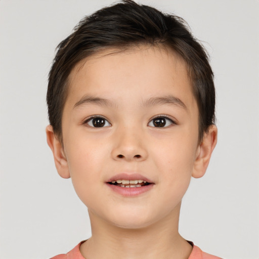 Joyful white child male with short  brown hair and brown eyes