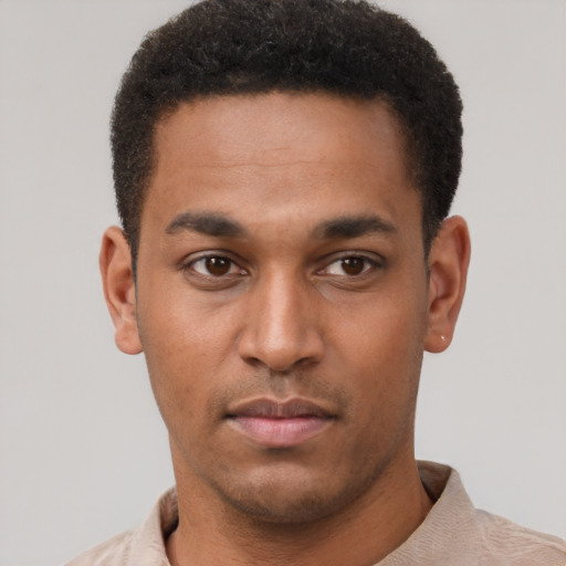 Neutral latino young-adult male with short  brown hair and brown eyes