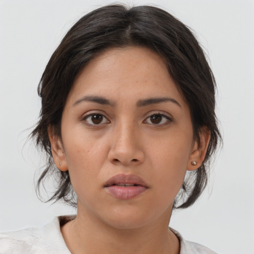 Neutral asian young-adult female with medium  brown hair and brown eyes