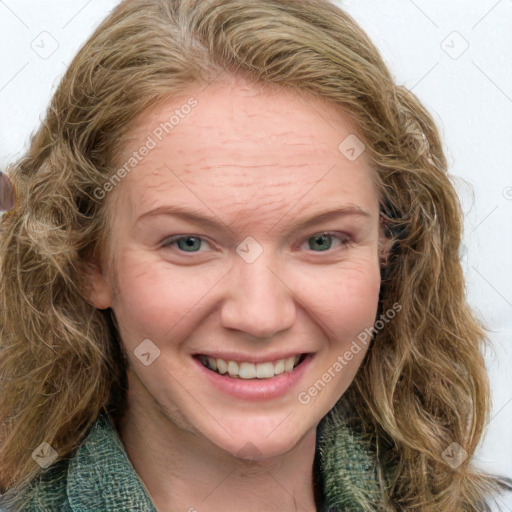 Joyful white young-adult female with medium  brown hair and blue eyes