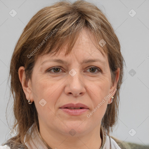 Joyful white adult female with medium  brown hair and brown eyes