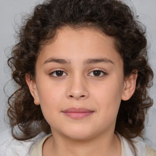 Joyful white child female with medium  brown hair and brown eyes