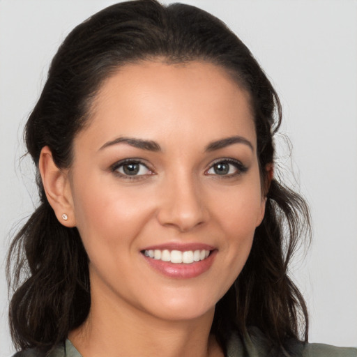 Joyful white young-adult female with medium  brown hair and brown eyes