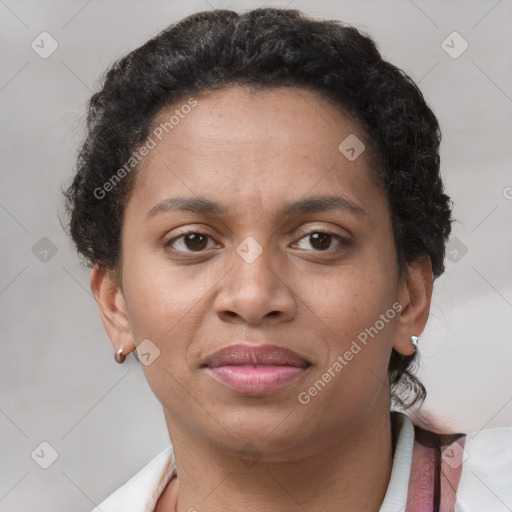 Joyful latino young-adult female with short  brown hair and brown eyes