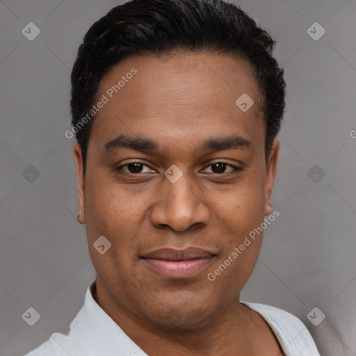 Joyful latino young-adult male with short  black hair and brown eyes