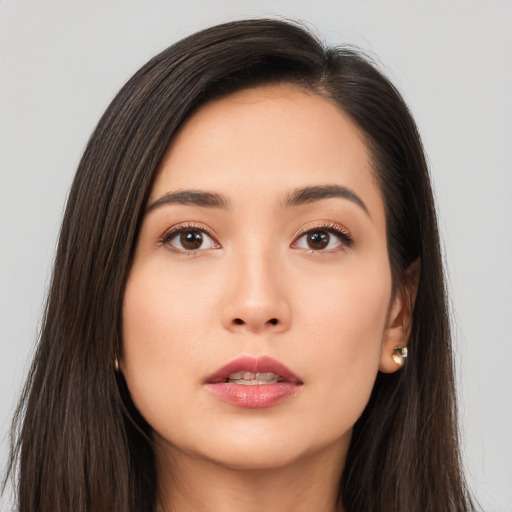 Neutral asian young-adult female with long  brown hair and brown eyes