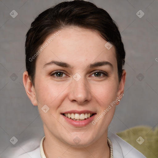 Joyful white young-adult female with short  brown hair and brown eyes