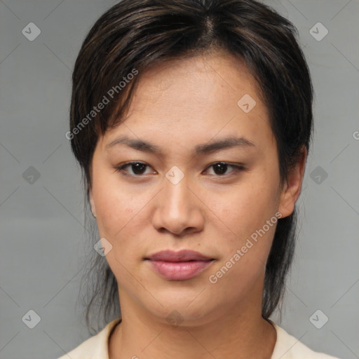 Joyful asian young-adult female with medium  brown hair and brown eyes