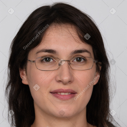 Joyful white adult female with long  brown hair and brown eyes