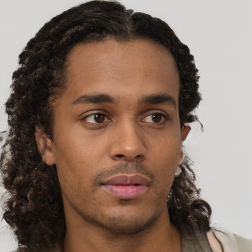 Neutral black young-adult male with short  brown hair and brown eyes