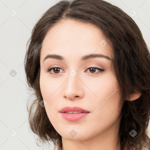 Neutral white young-adult female with long  brown hair and brown eyes