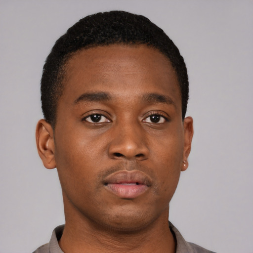 Neutral black young-adult male with short  brown hair and brown eyes