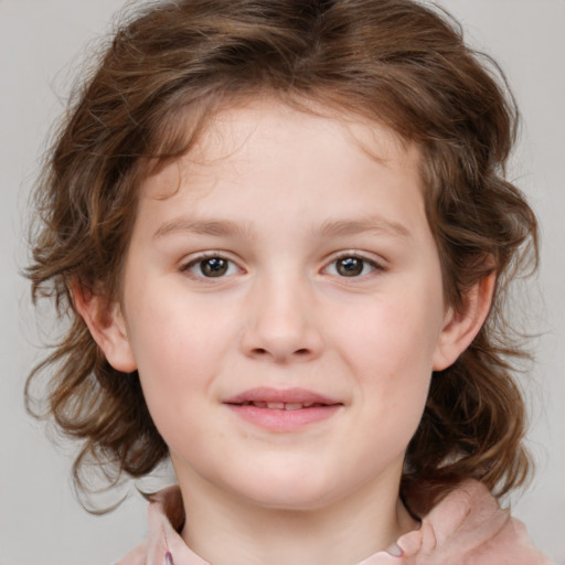 Joyful white child female with medium  brown hair and brown eyes