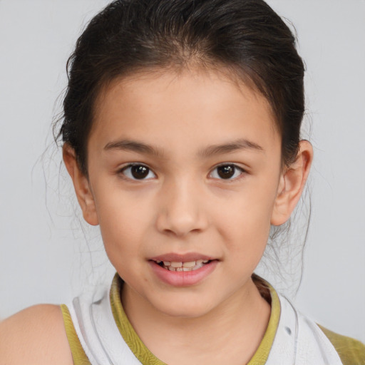 Joyful white child female with medium  brown hair and brown eyes