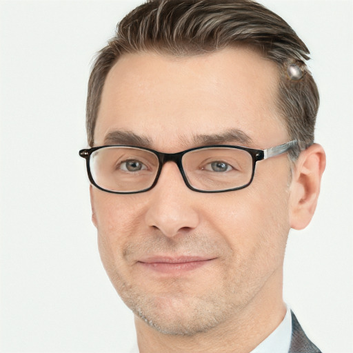 Joyful white adult male with short  brown hair and grey eyes