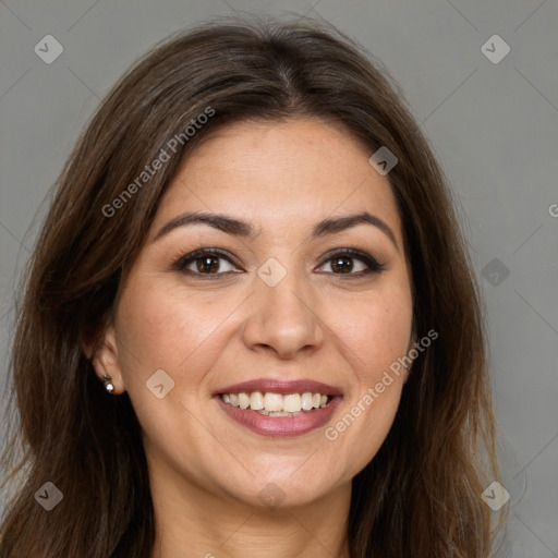 Joyful white young-adult female with long  brown hair and brown eyes