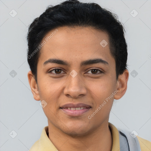 Joyful latino young-adult male with short  brown hair and brown eyes