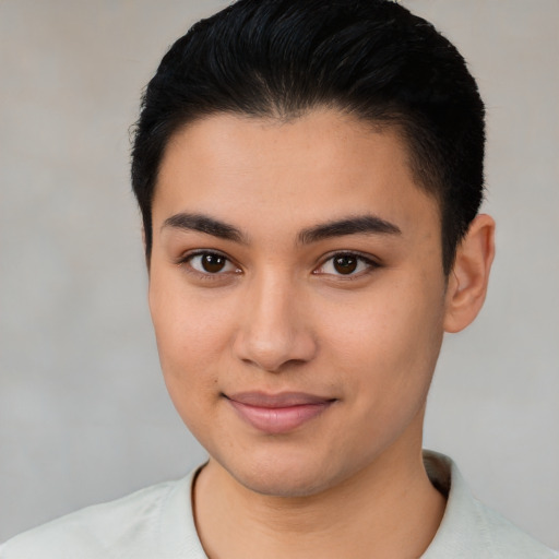 Joyful latino young-adult female with short  black hair and brown eyes