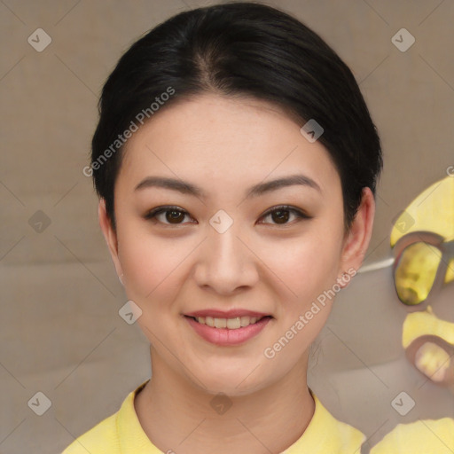 Joyful asian young-adult female with short  brown hair and brown eyes