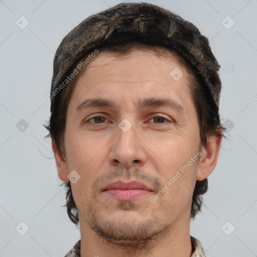 Joyful white adult male with short  brown hair and brown eyes