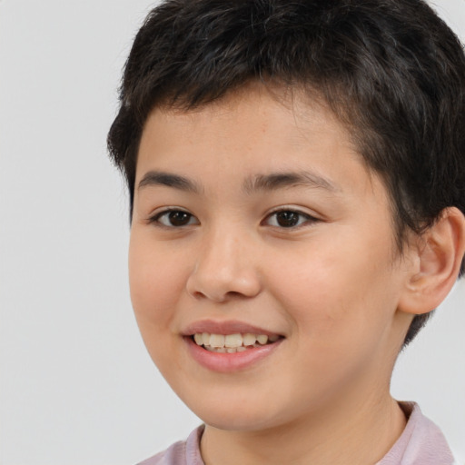 Joyful white child female with short  brown hair and brown eyes