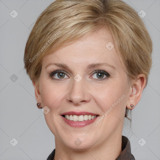 Joyful white young-adult female with medium  brown hair and blue eyes