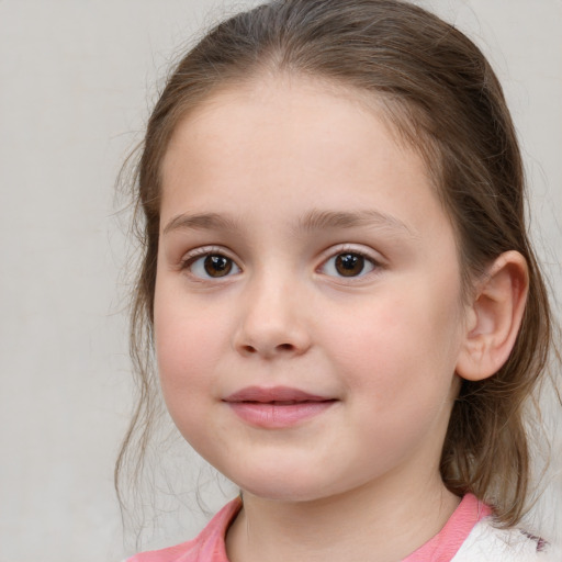 Joyful white child female with medium  brown hair and grey eyes