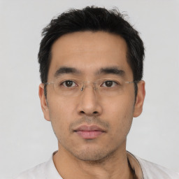 Neutral asian young-adult male with short  black hair and brown eyes