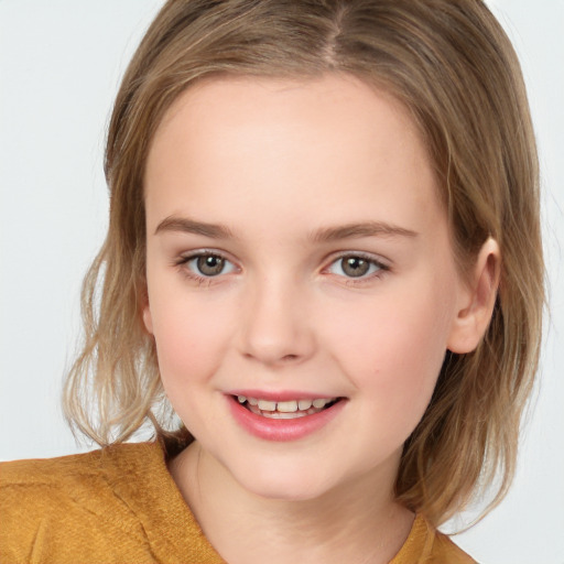 Joyful white child female with medium  brown hair and brown eyes