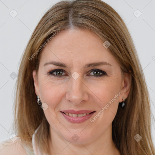 Joyful white adult female with medium  brown hair and grey eyes