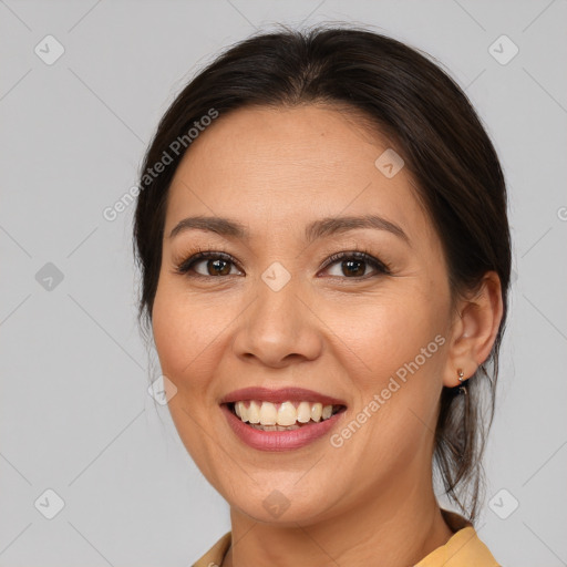 Joyful white young-adult female with medium  brown hair and brown eyes