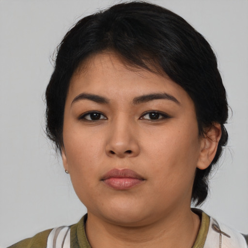 Neutral latino young-adult female with medium  black hair and brown eyes