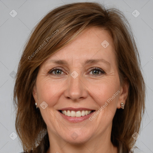 Joyful white adult female with medium  brown hair and brown eyes