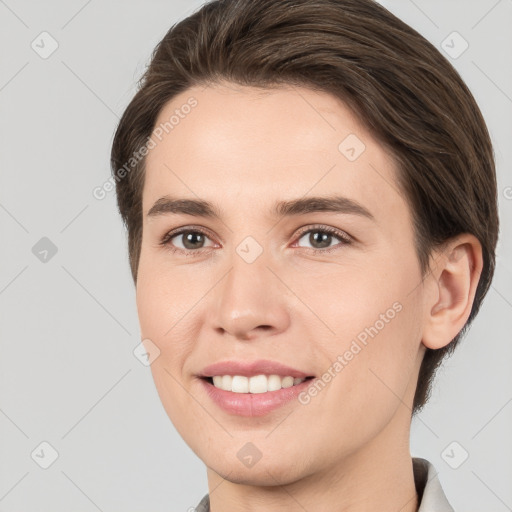 Joyful white young-adult female with medium  brown hair and brown eyes