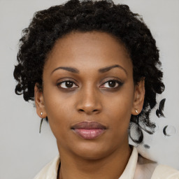 Neutral black young-adult female with short  brown hair and brown eyes