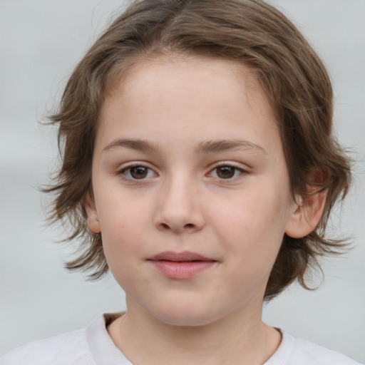 Joyful white child female with medium  brown hair and brown eyes