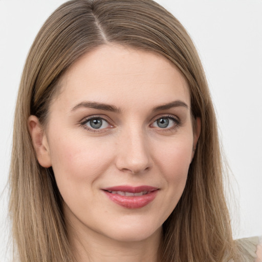 Joyful white young-adult female with long  brown hair and grey eyes