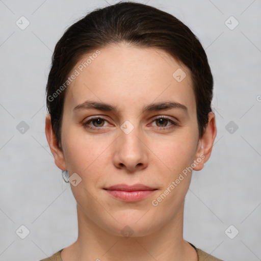 Joyful white young-adult female with short  brown hair and grey eyes