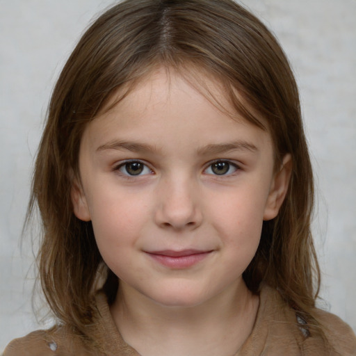 Joyful white child female with medium  brown hair and grey eyes