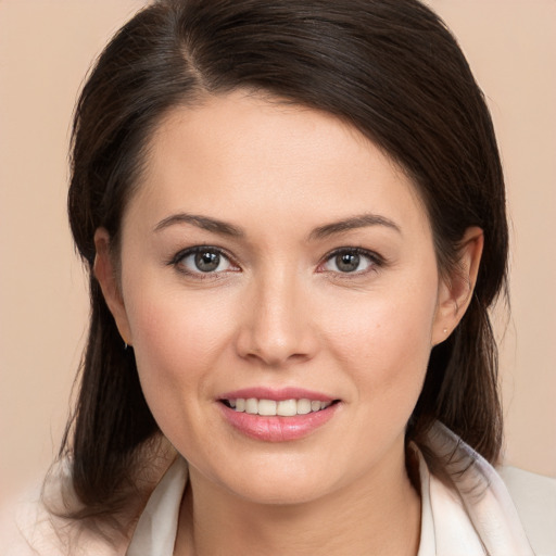 Joyful white young-adult female with medium  brown hair and brown eyes