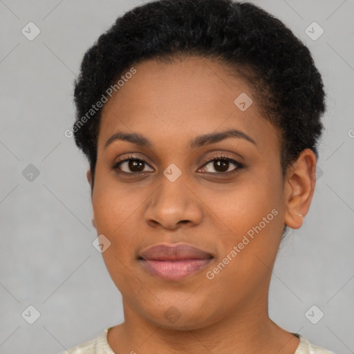 Joyful black young-adult female with short  brown hair and brown eyes