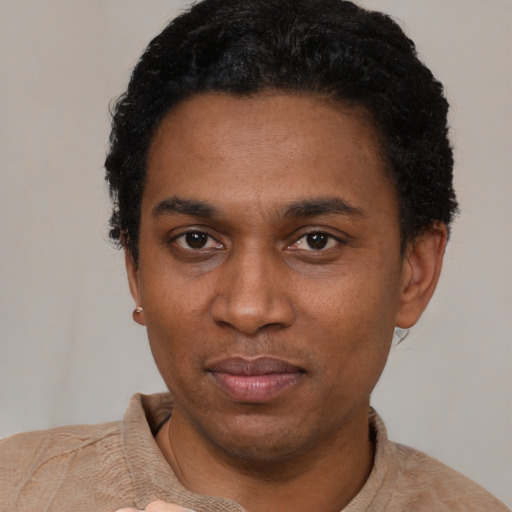 Neutral black adult male with short  black hair and brown eyes