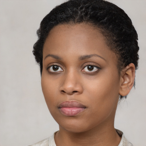 Neutral black young-adult female with short  brown hair and brown eyes