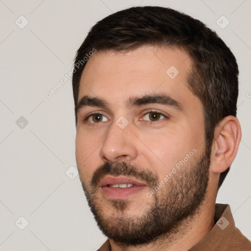 Neutral white young-adult male with short  black hair and brown eyes