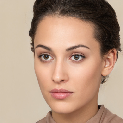 Neutral white young-adult female with long  brown hair and brown eyes