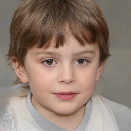 Joyful white child male with medium  brown hair and brown eyes