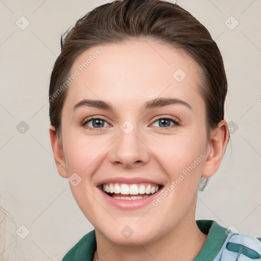 Joyful white young-adult female with medium  brown hair and green eyes